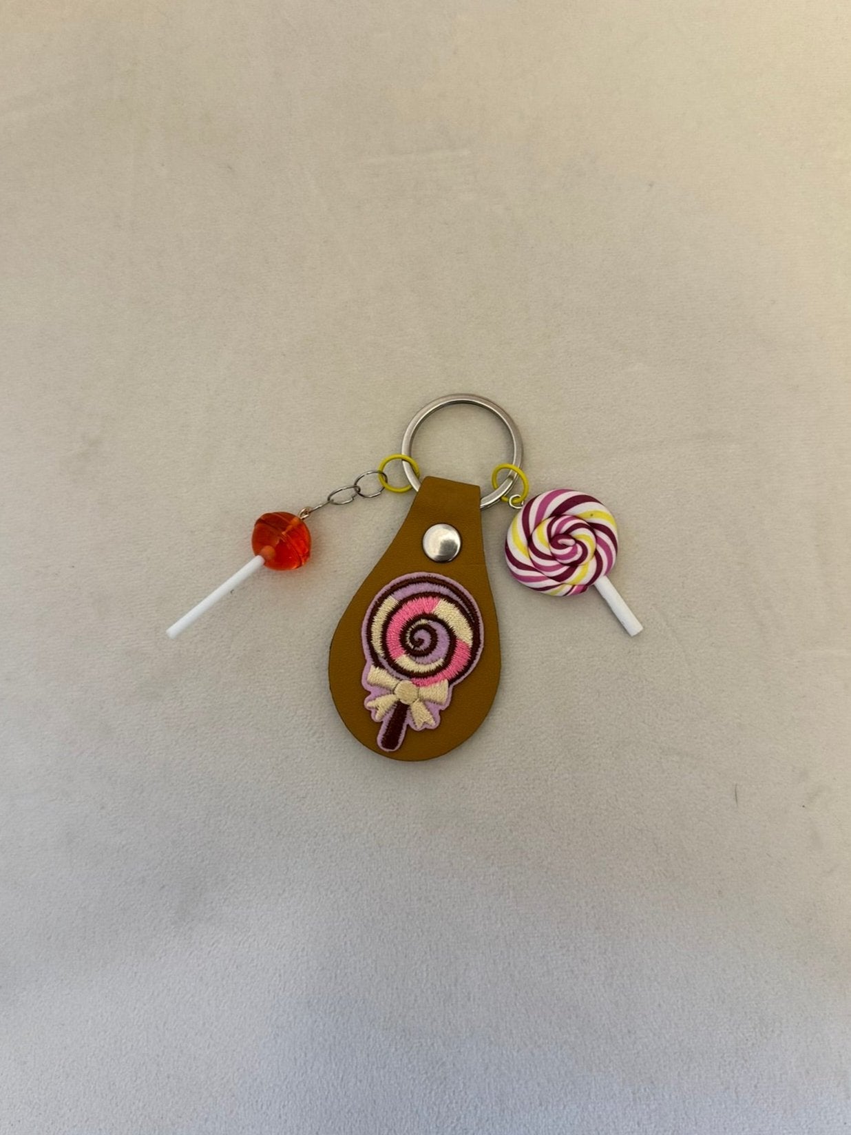 Sweet Swirl Delight: Lollipop Keychain Charm